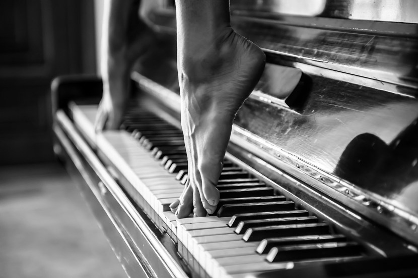 The legs of the piano