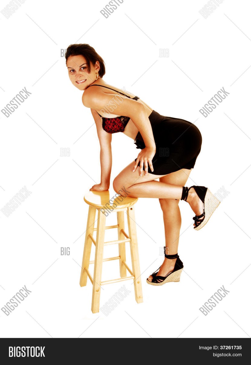 The girl rests on a chair