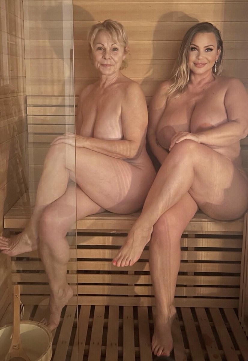 Two naked women in the bathhouse