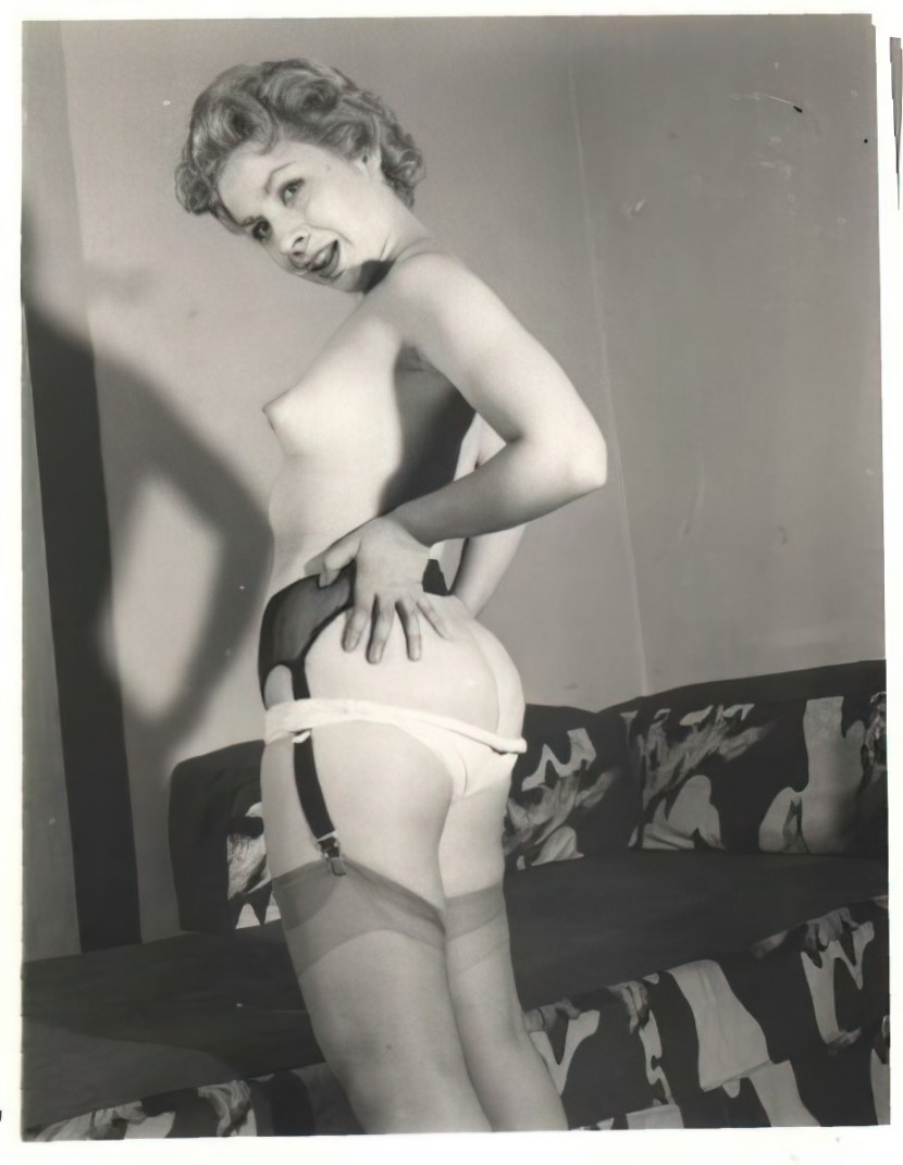 Pornstar in a corset and stockings retro