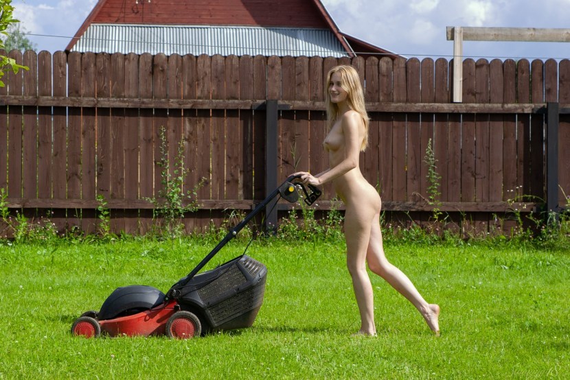 Naked girls mow grass