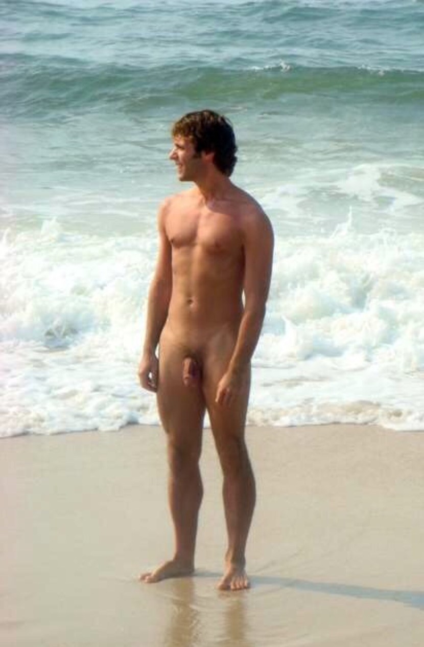 Beautiful naked men on the beach