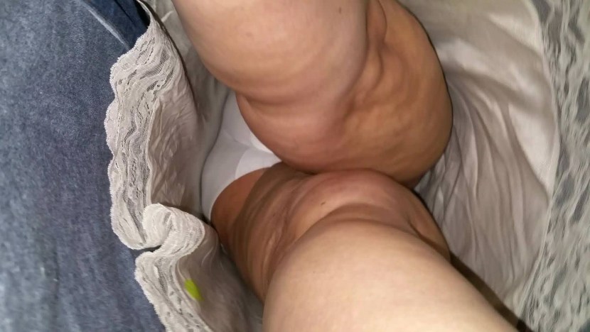 Panties under the skirt of the old woman