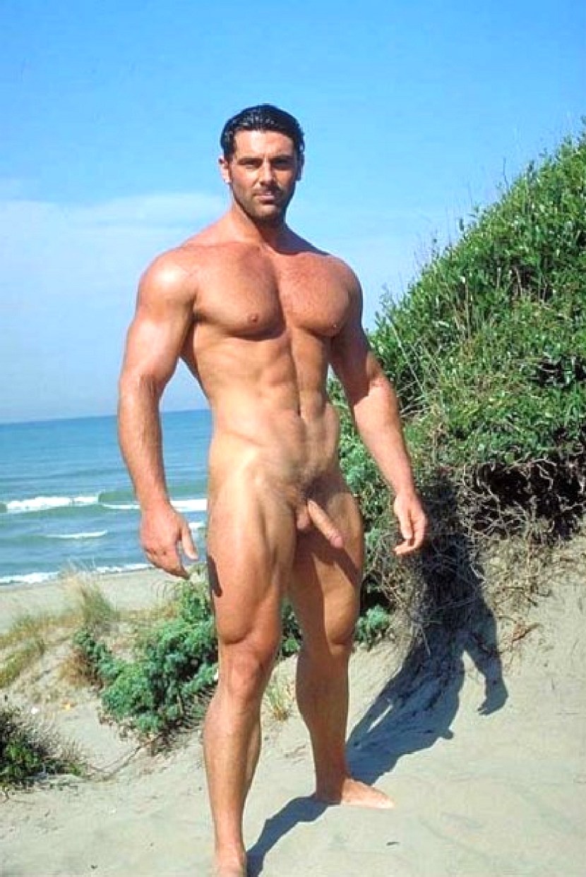 Naked pumped up guys on the beach