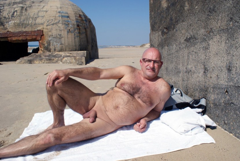 Naked elderly men on the beach