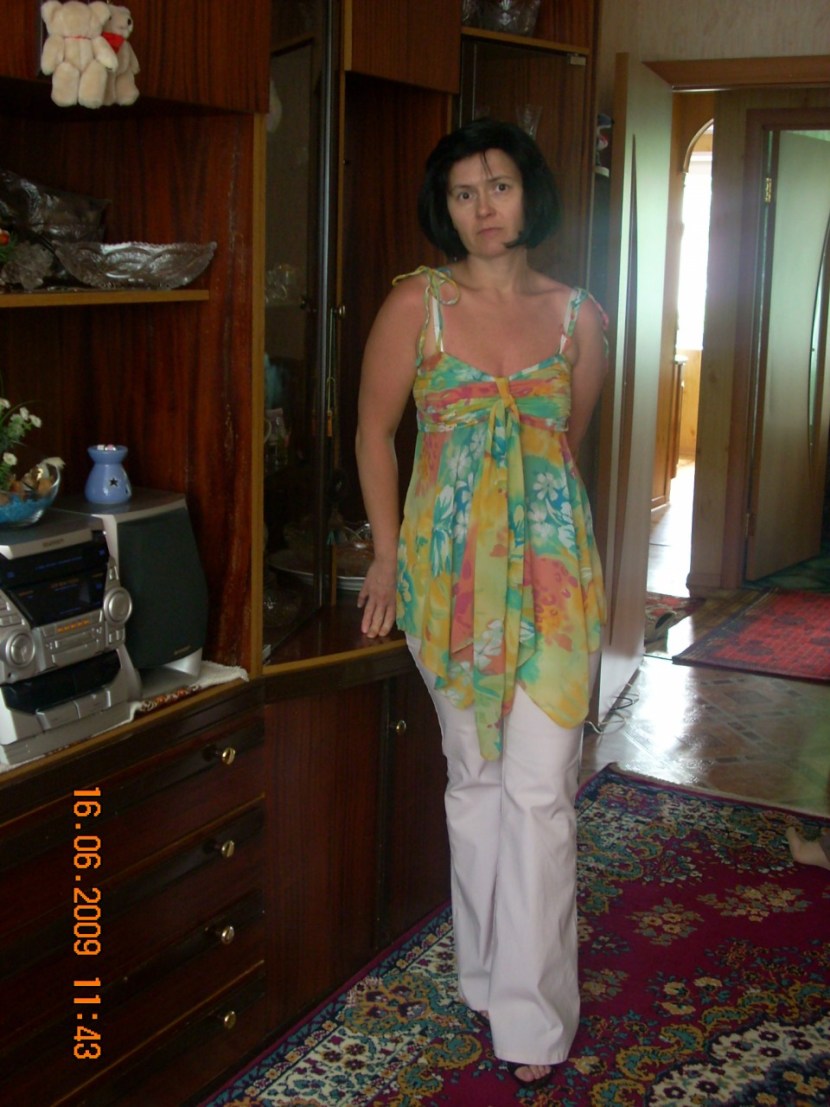 Julia Kuvarzina in a swimsuit