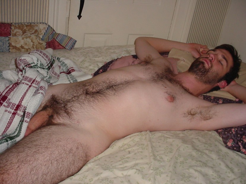 A drunken naked man sleeps