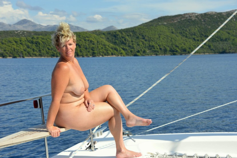 Naked adult women on a yacht