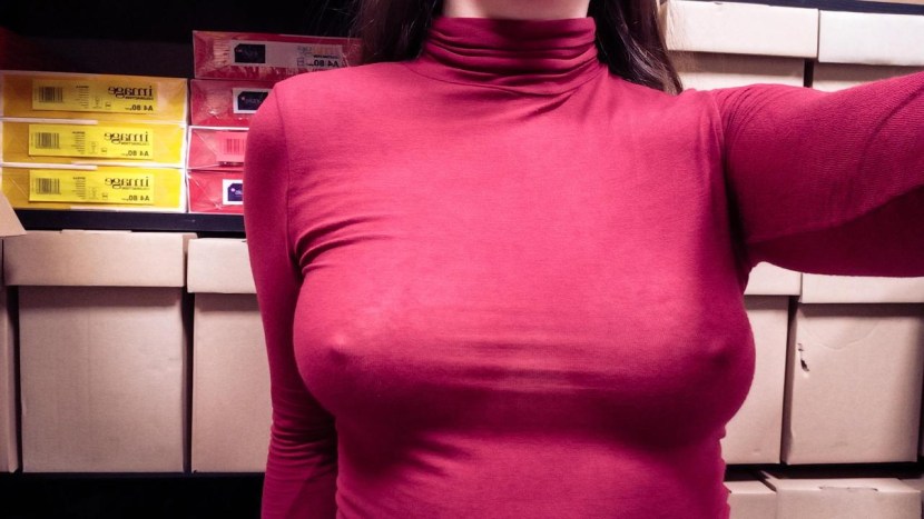 Big breasts in a sweater 40 years old