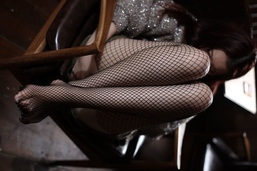 Girls with a square in stockings and in the office