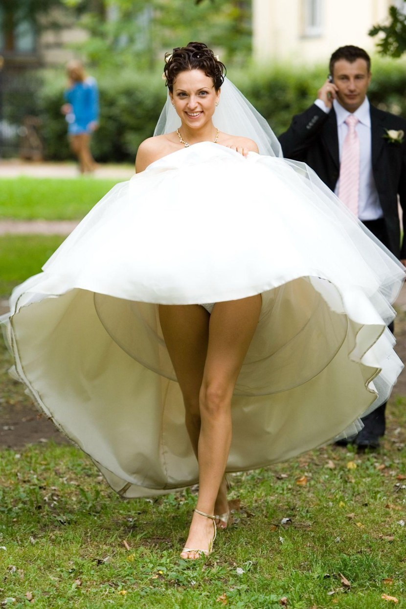 Under the hem of the skirt