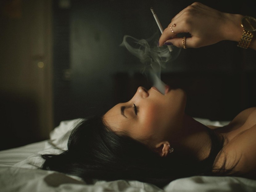 The girl smokes