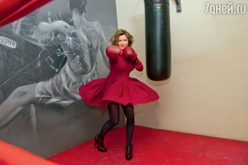 Irina Pegova in a red dress