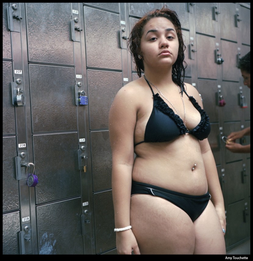 Sports girl in the locker room
