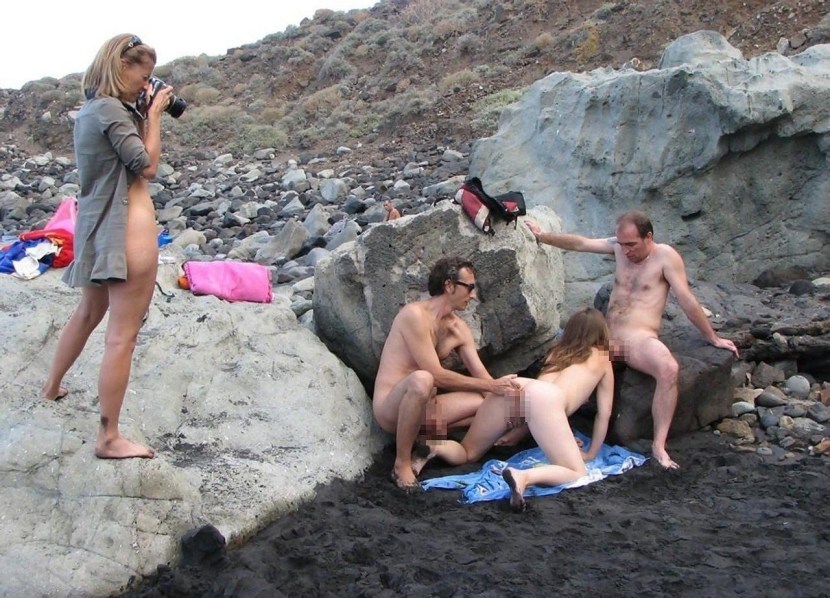 Naked girls fuck on the beach