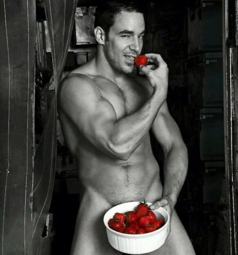 A man with strawberries