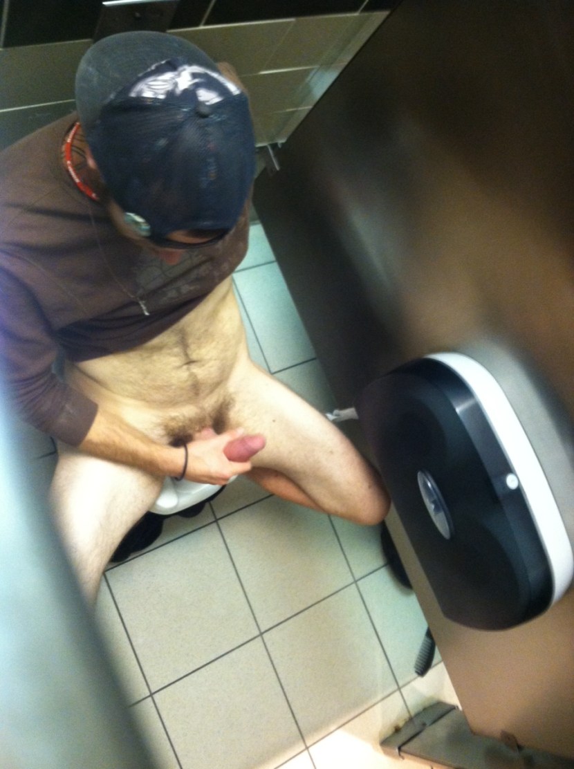 Naked men in a public toilet