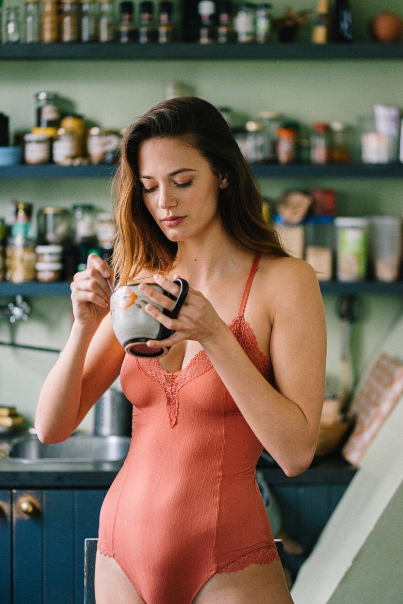 Mature Redhead Woman undresses and Poses in White Panties and Red Bra in adult video