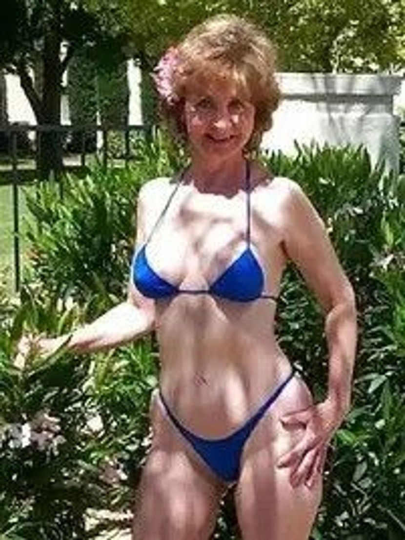 Older women in micro bikini