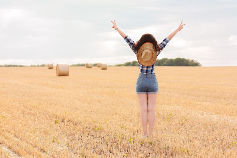 Girls in shorts on the hay