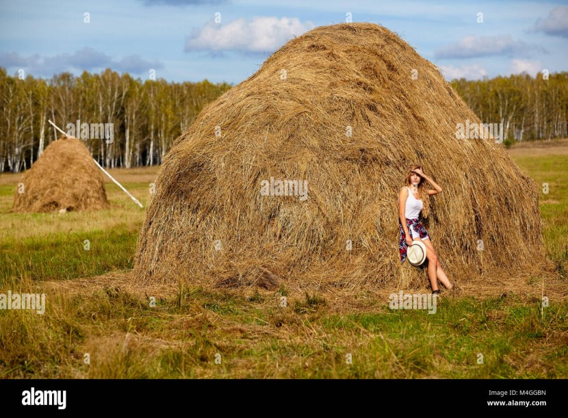 Girl on a haystack