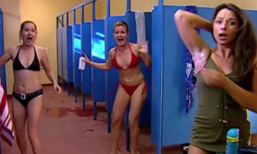 Naked football players in the locker room