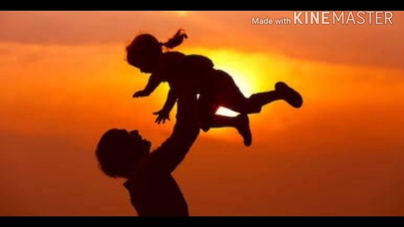 Father and daughter at sunset