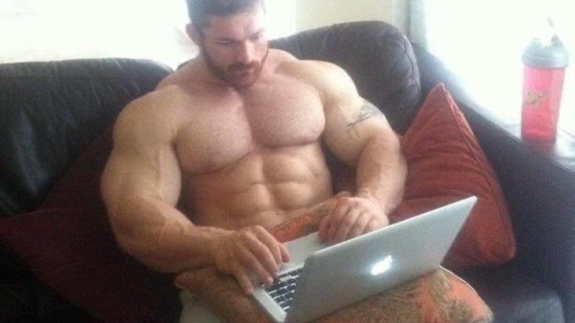 Naked man at a computer