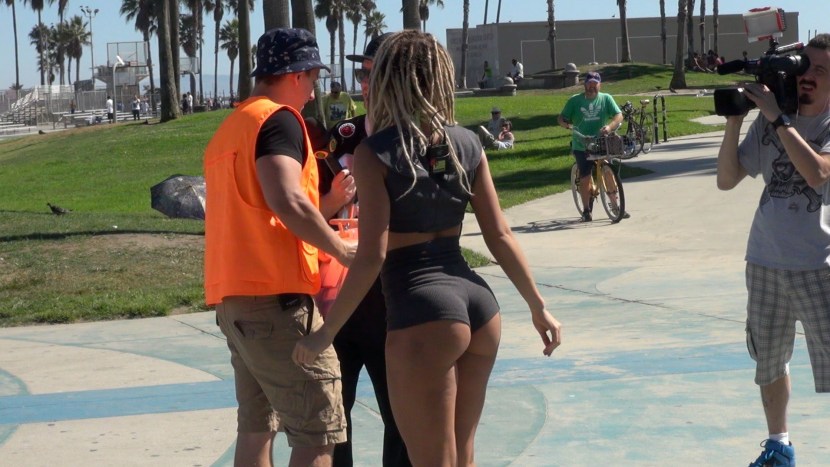 The guy kisses the guy in bed