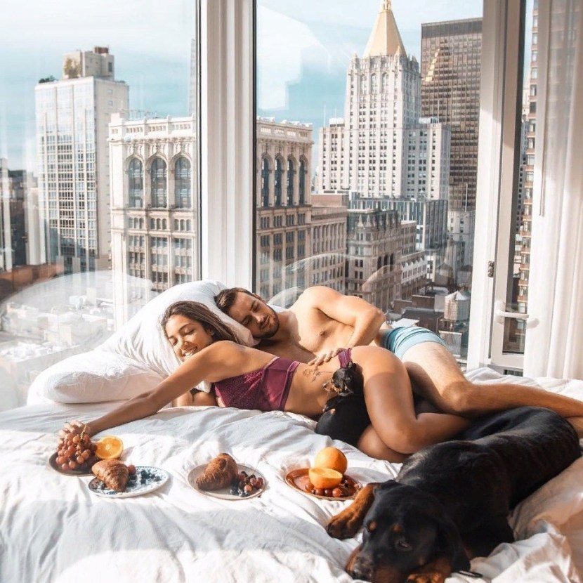 Brunette girl in bed