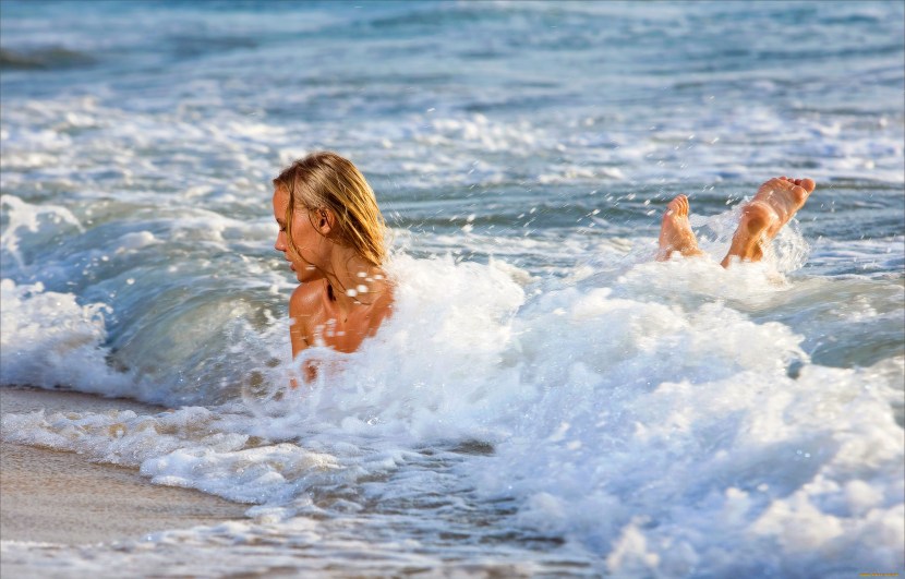 Girl swimming in the sea