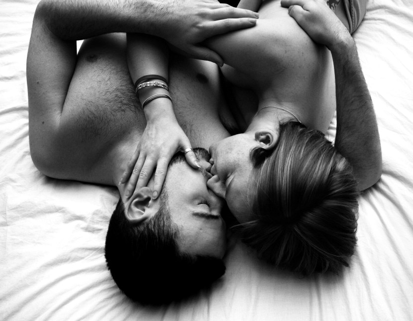 Love and kisses in bed