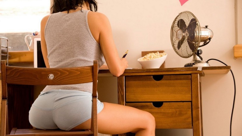 Girl at the table from the back