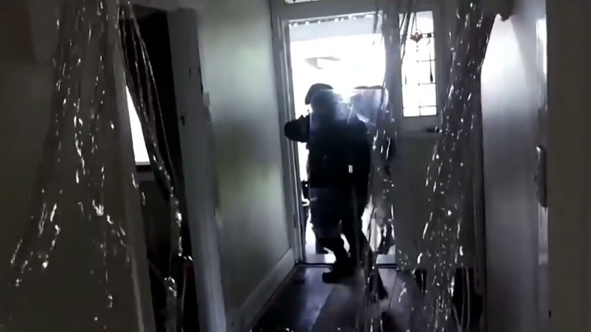 The girl locks the door