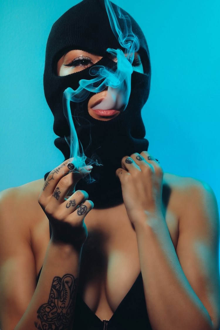 Erotic girl in a mask