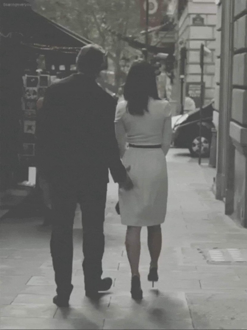 The girl touches the man