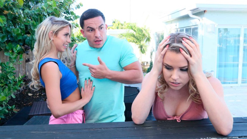 Aubrey Sinclair in a dress with men