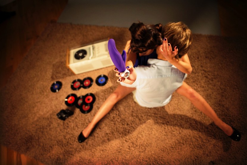 Fucking with a rubber member in the pose of a rider