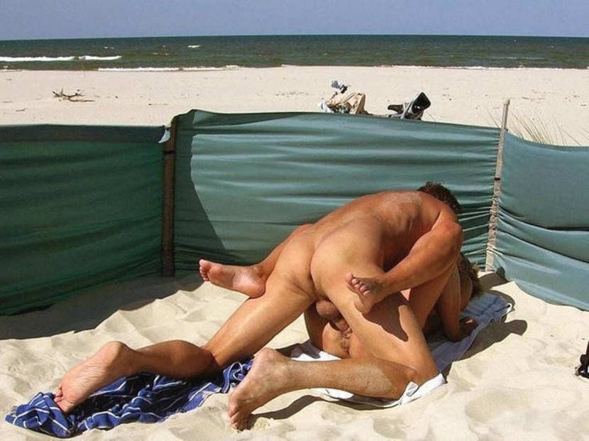 Naked girls fuck on the beach
