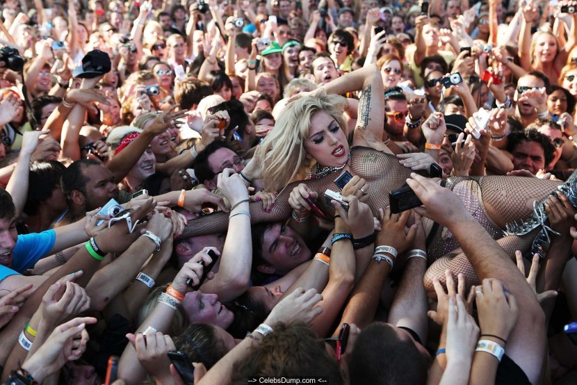 Naked in front of a crowd of men