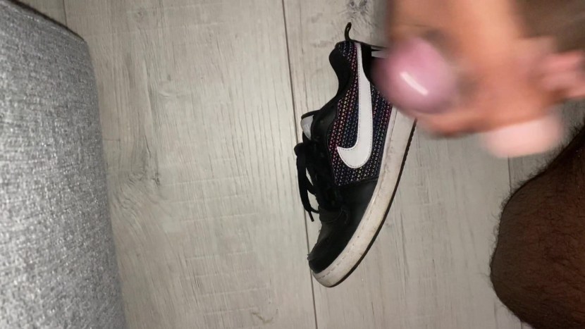 Women's legs in purple shoes