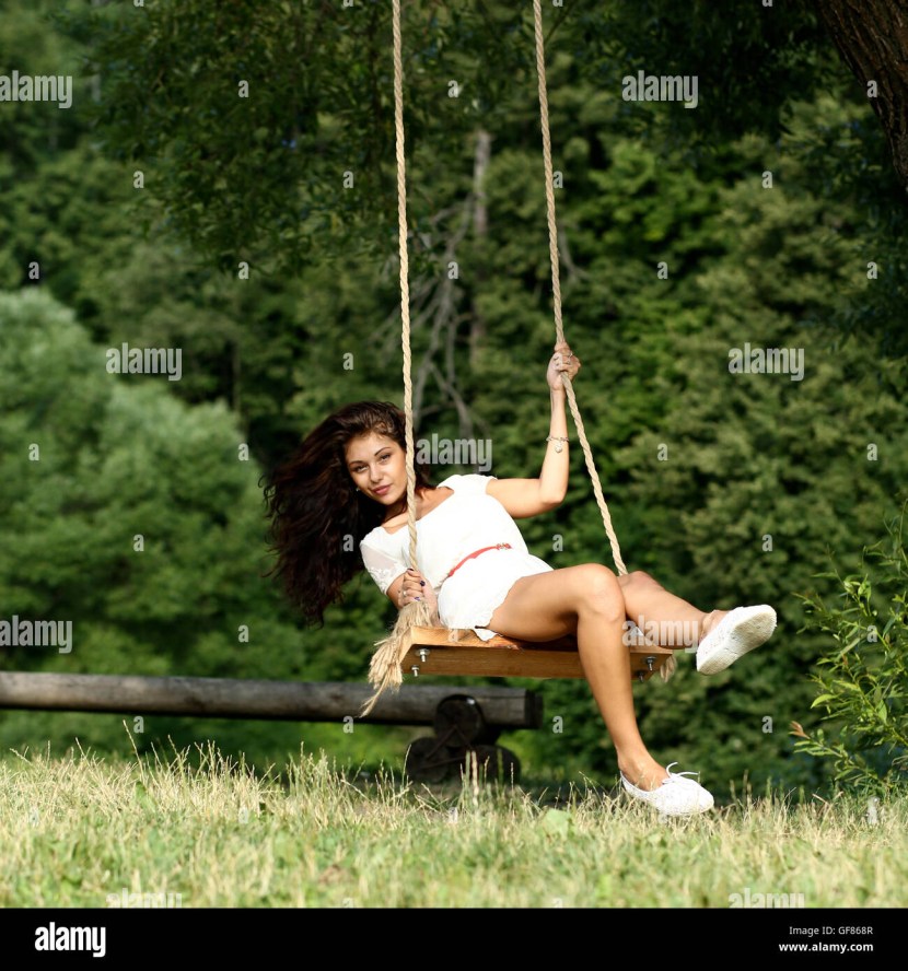 Girl on a swing in the park