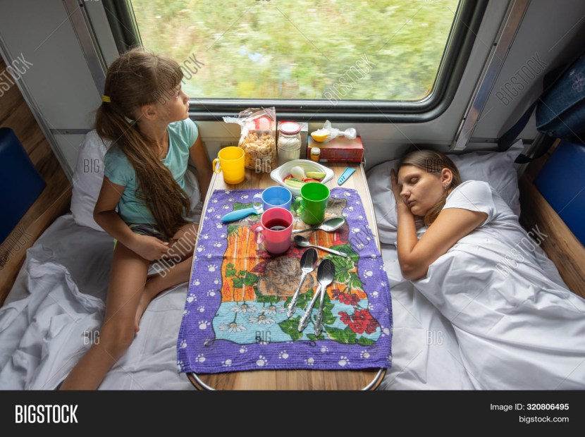 Children sleep on the train