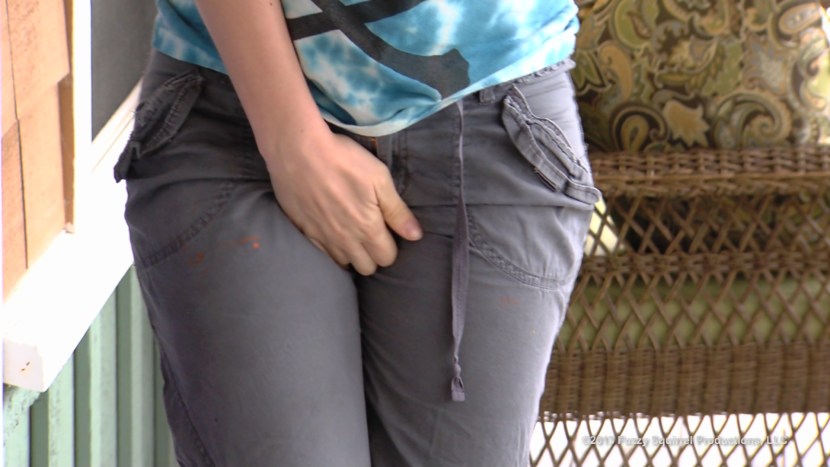 Man Hands Pants in His