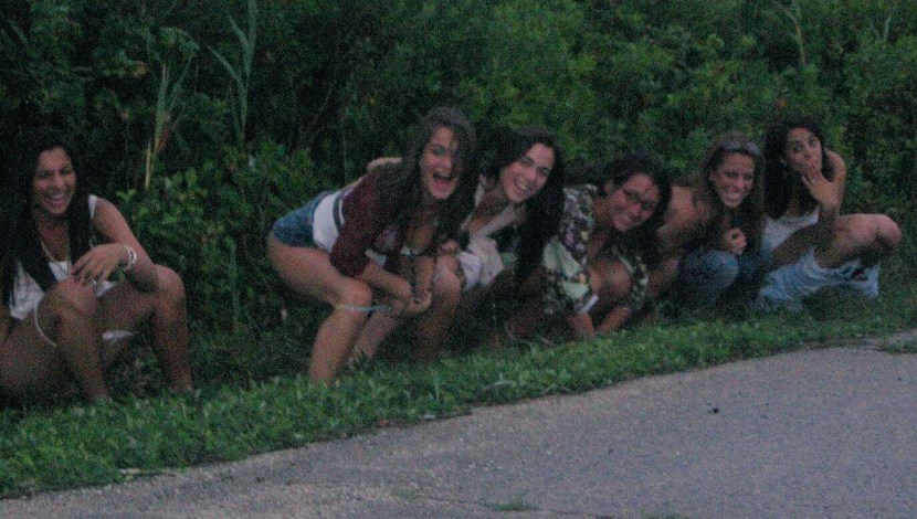 Pising girls on the street