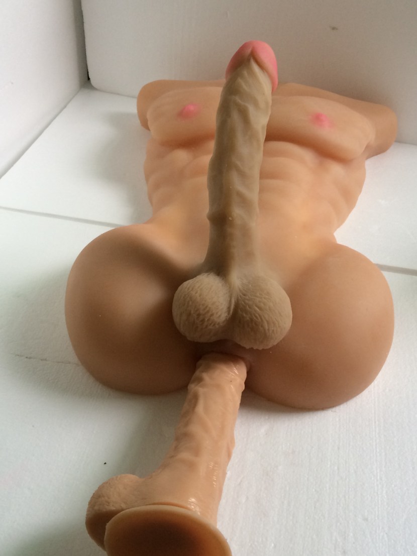 Huge dildo in the hand
