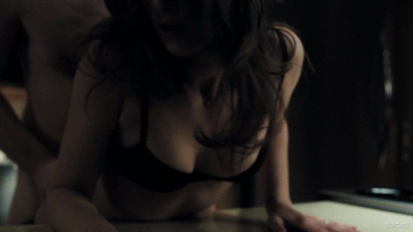 Vera Farmiga in an erotic scene