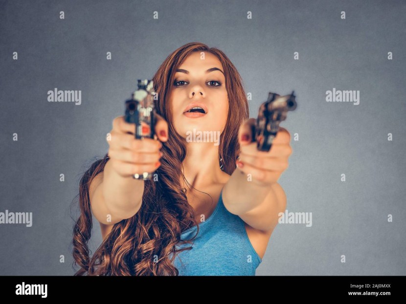 Girls with a gun in their hands