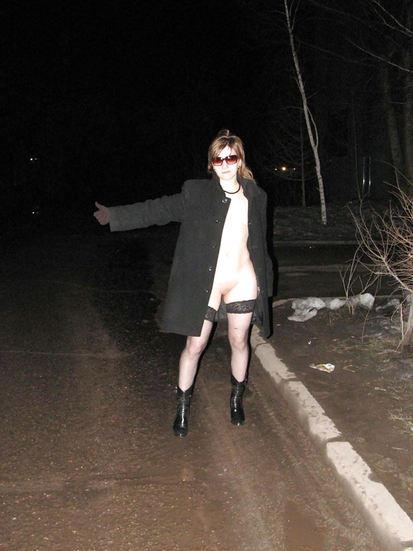 Mature undressed on the road