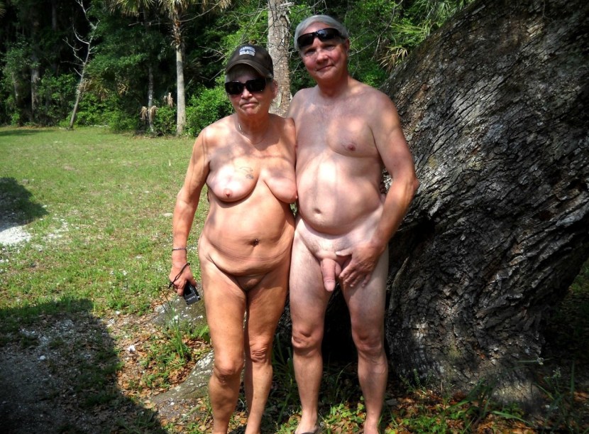 Mature nudists spread their legs